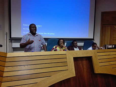 CAS Honorary Associate Dr Fani Ncapayi presents on 'Methodologies used to investigate the lives of residents in villages of the former Xhalanga district'.  Rest of panel from left to right: Professor Simphiwe Sesanti of UNISA (Chair); Mr Giyose of CA