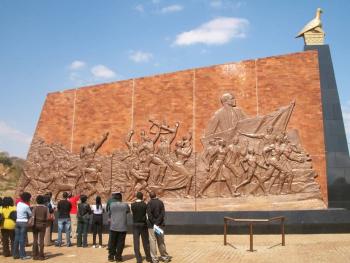 Visitors touring the Heroes Acres looking at three Bronze panels on the liberation struggle, independence and the election of R.G. Mugabe. (Picture by author