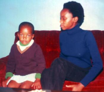 A young Xolelwa with Lindelwa Kabane, one her many "big" sisters