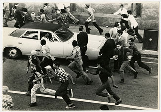 Crowds scatter up Darling Street as police fire teargas on Grand Parade, 9.9.1976