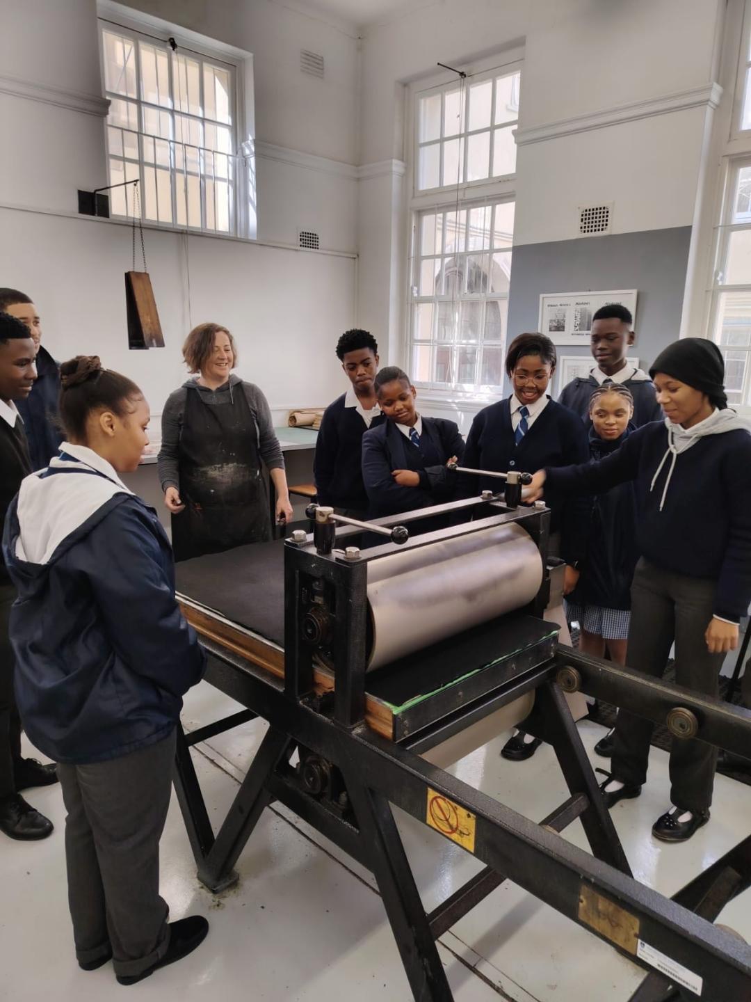 Students learning about the press