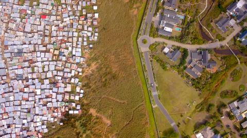 Aerial view of township and wealthy houses, in divided South Africa stock photo