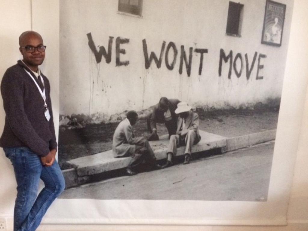 Ayanda Mahlaba at a tour of A.B. Xuma’s house in Sophiatown. The photograph on display “We Won’t Move’ was taken by Jurgen Schadeberg, in Sophatown in 1955.